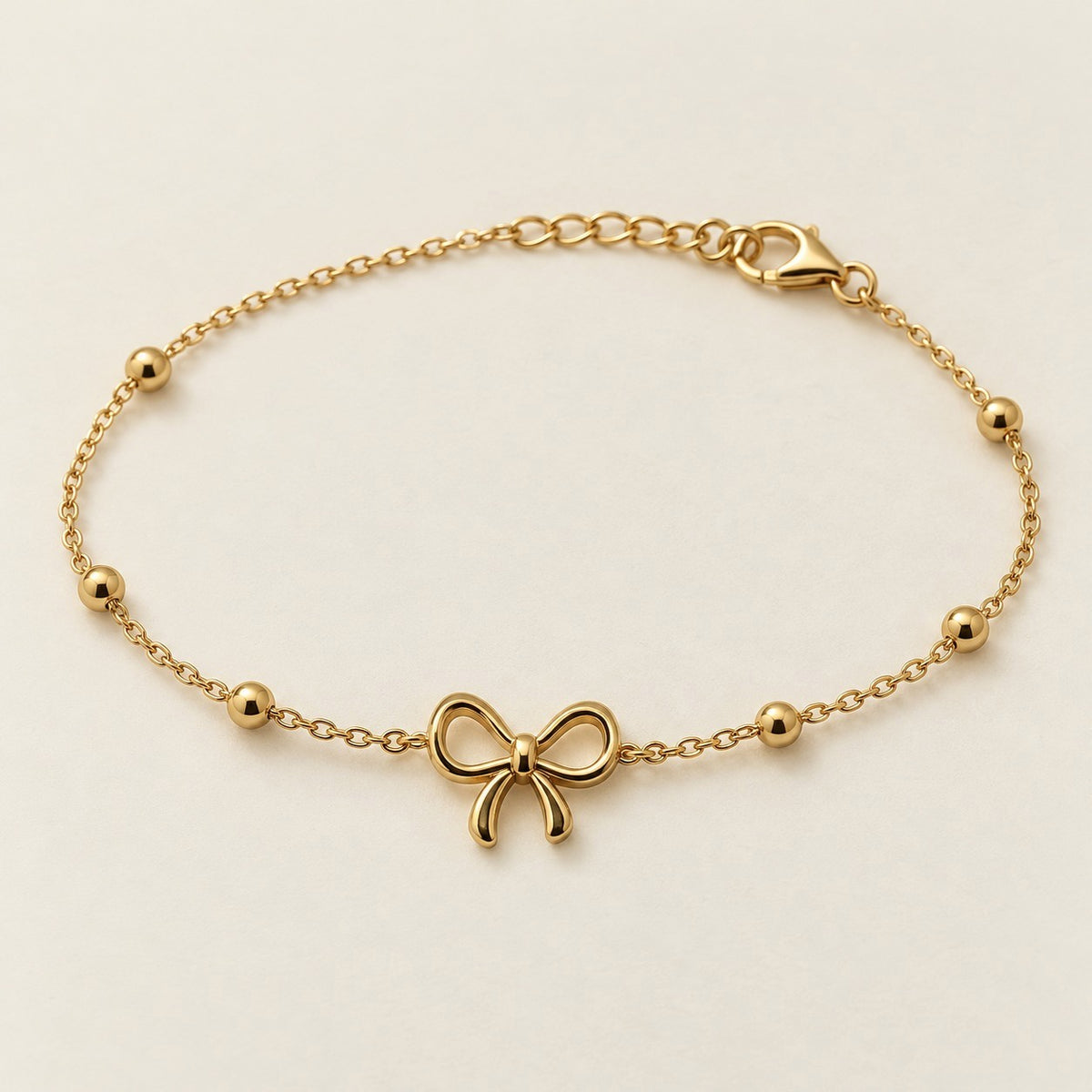 Bow Bead Bracelet product photo on cream