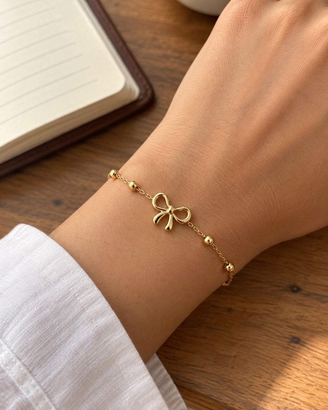 Bow Bead Bracelet worn on the wrist