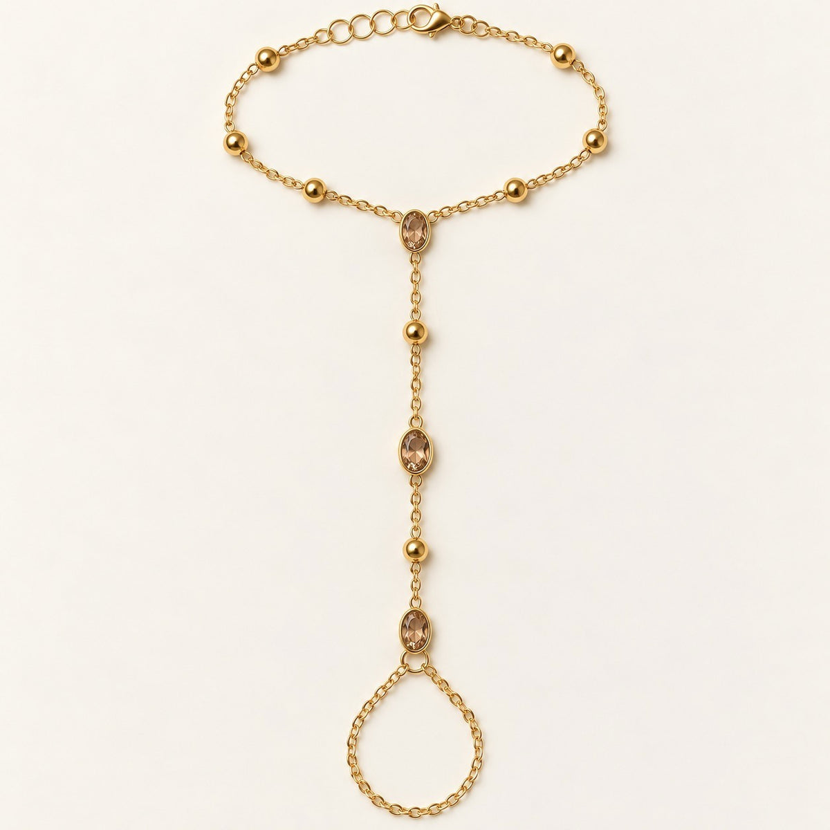 Champagne Oval Hand Chain product photo on cream