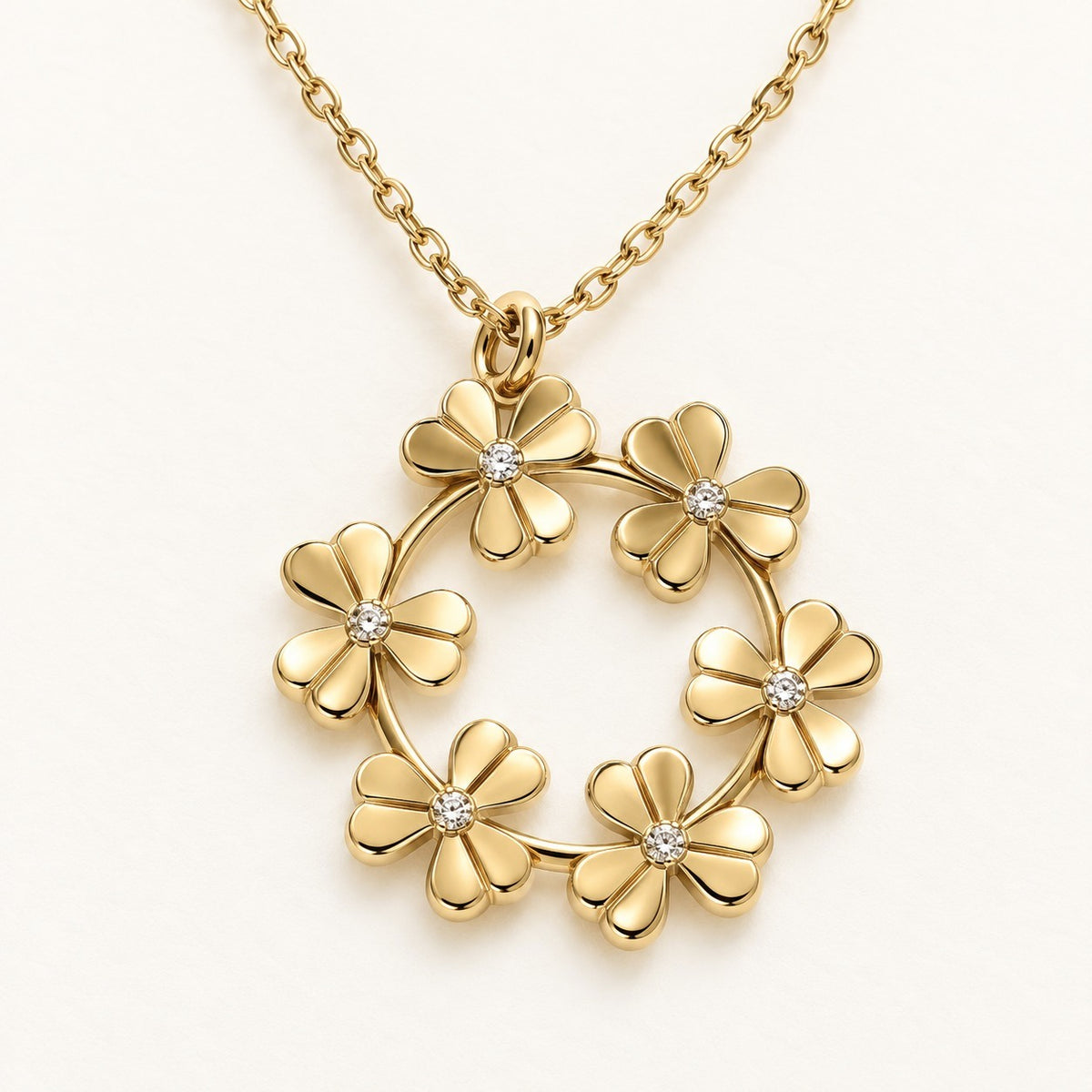 Clover Wreath Necklace product photo on cream