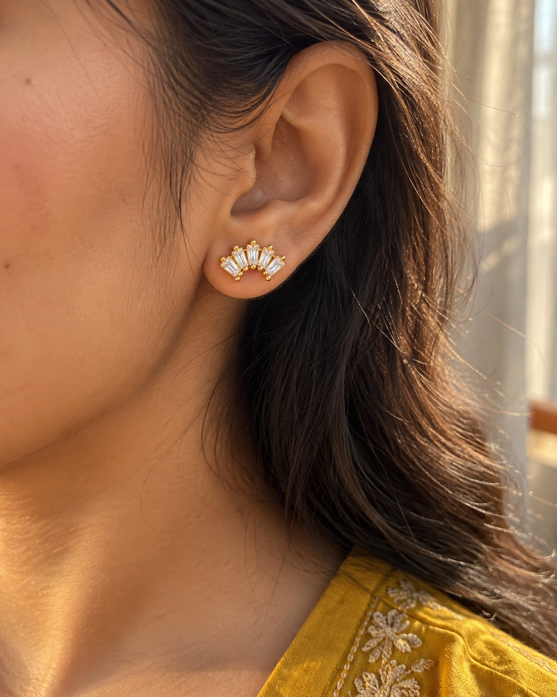 Crystal Fan Studs worn by a model