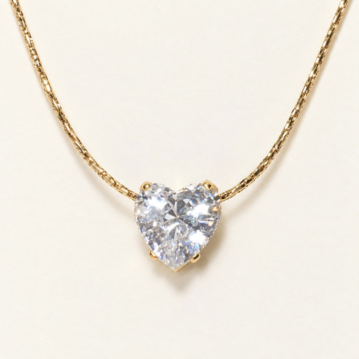 Crystal Heart Solitaire Necklace product photo on cream