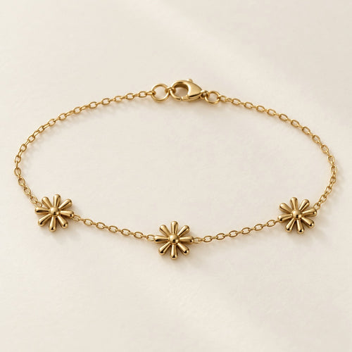 Golden Daisy Bracelet product photo on cream