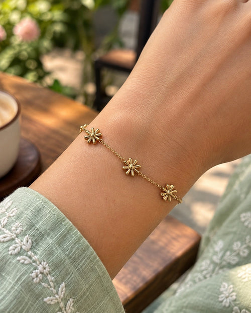 Golden Daisy Bracelet worn on the wrist