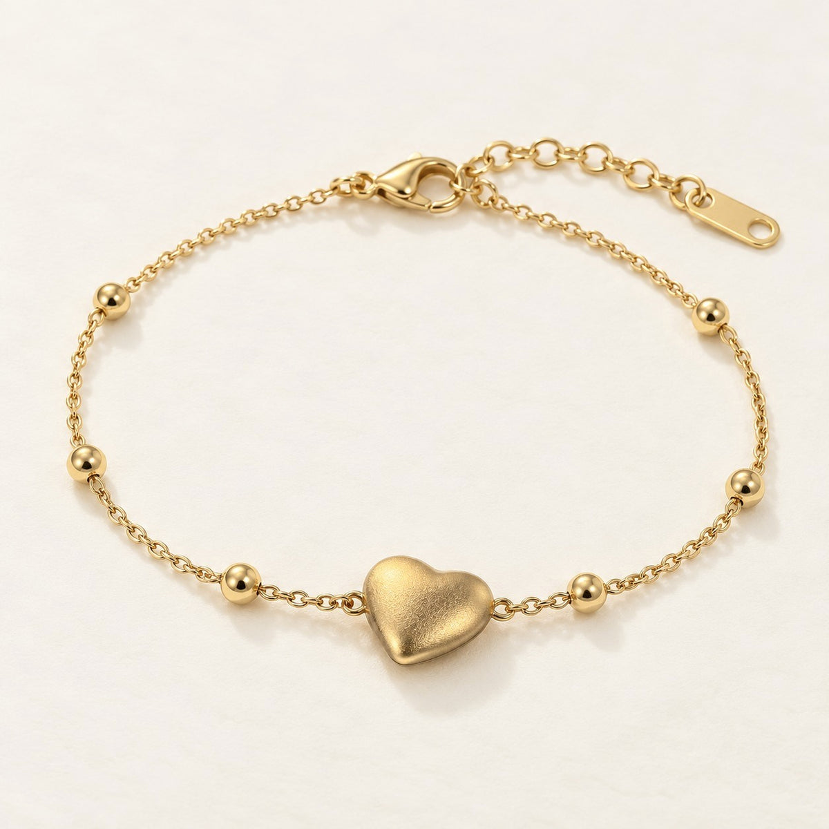 Golden Heart Bead Bracelet product photo on cream