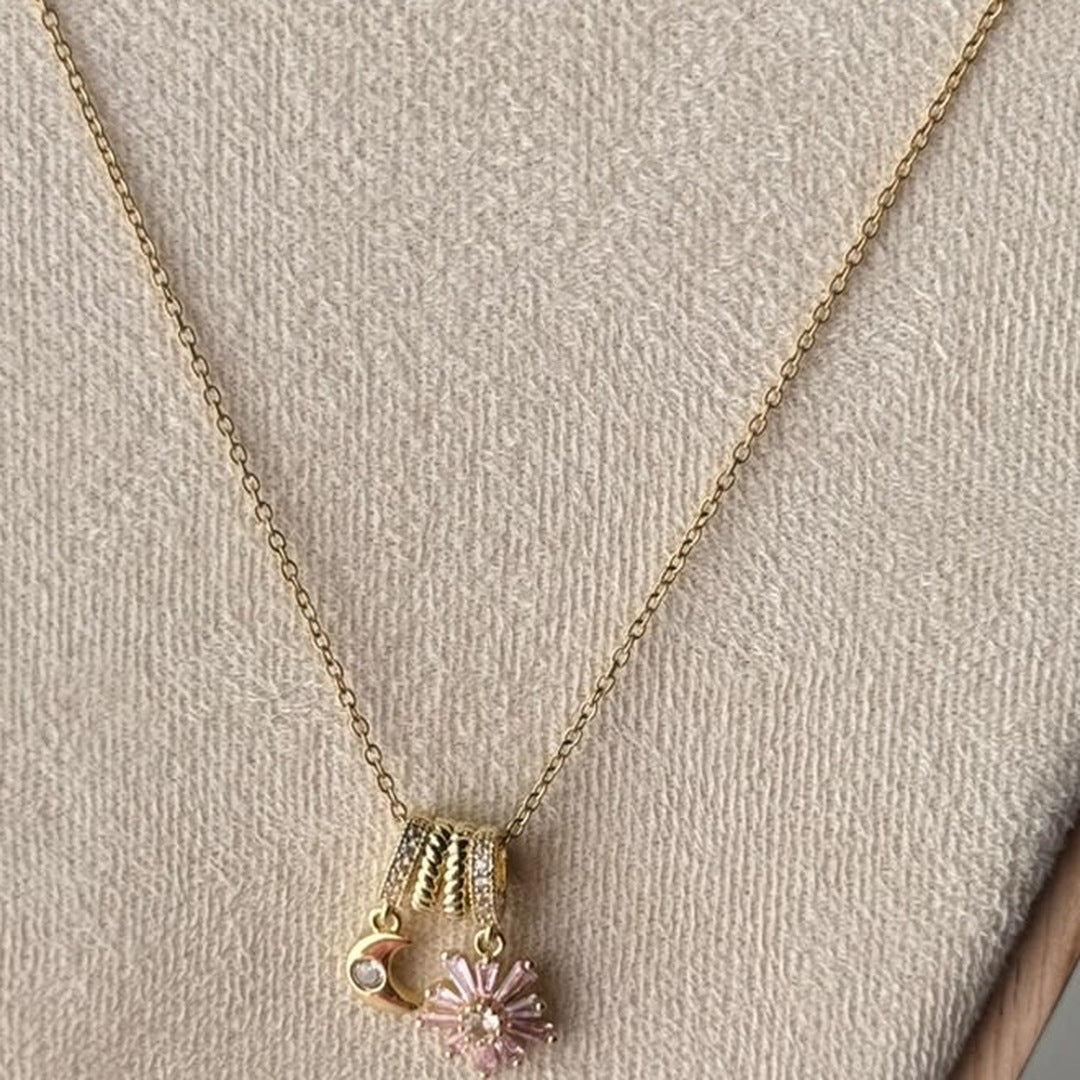 Moon & Blossom Charm Necklace – real photo on cream velvet
