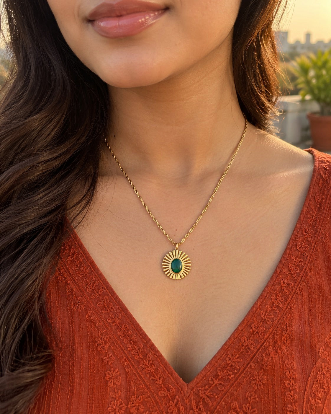 Emerald Sunray Disc Necklace worn