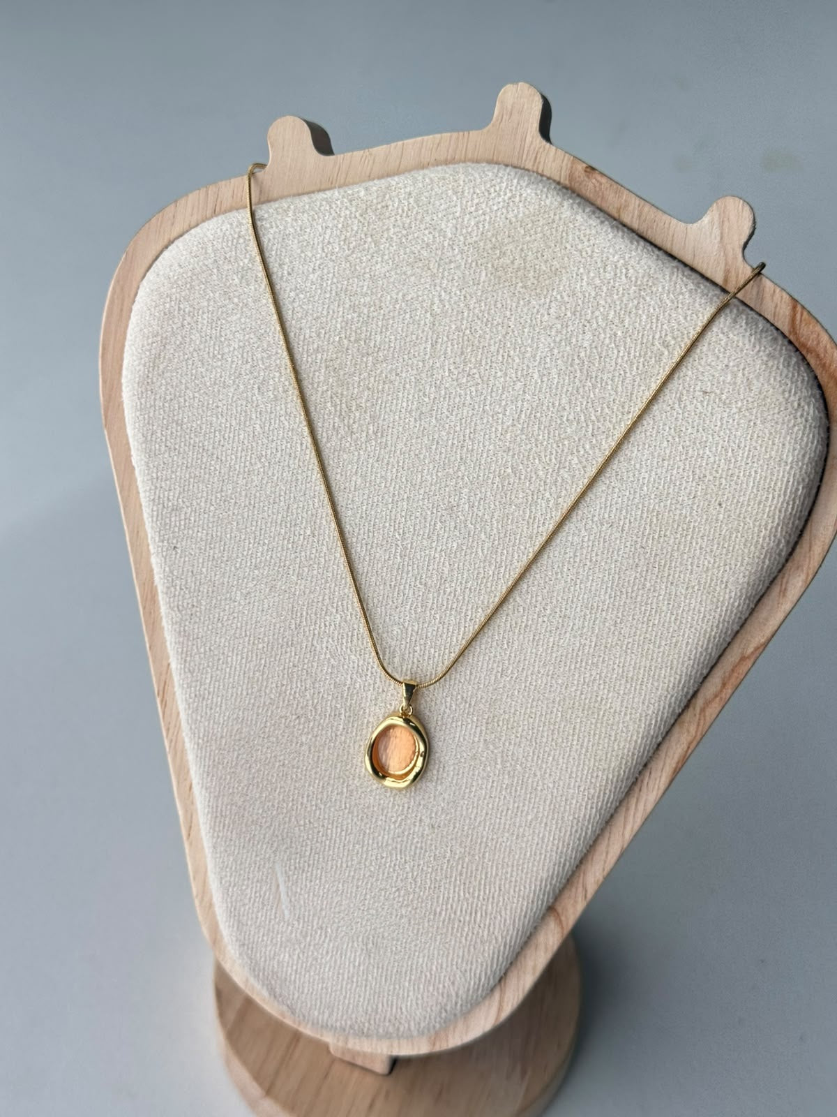 Molten Frame Cat-Eye Necklace in peach, real photo