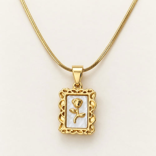 Rose Frame Pendant Necklace on a cream background