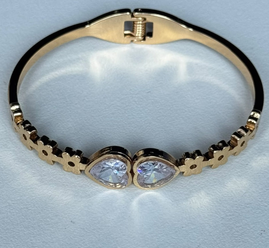 Twin Heart Daisy Bangle in clear, real photo