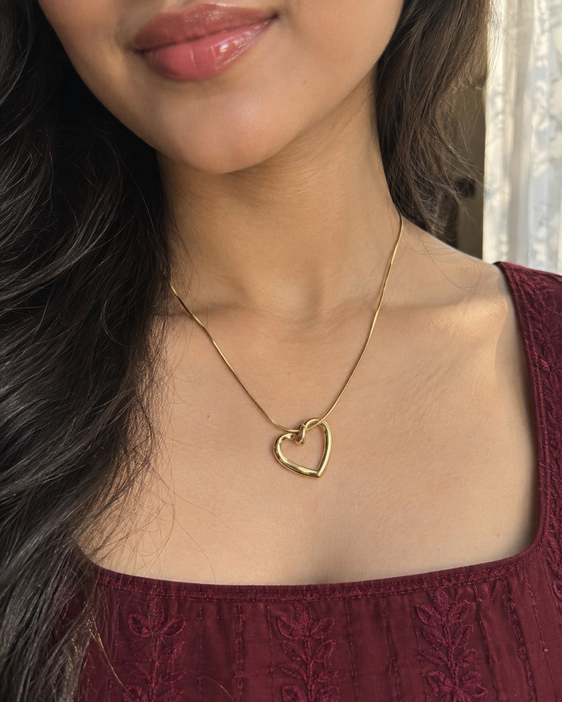 Open Heart Snake Chain Necklace worn by a model