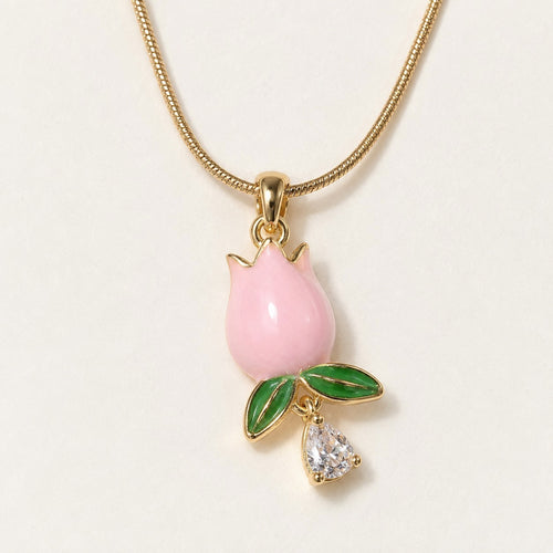 Pink Enamel Tulip Necklace product photo on cream