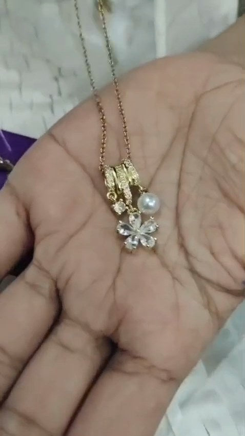 Diyah · Kozhikode · flower-pearl-charm-necklace