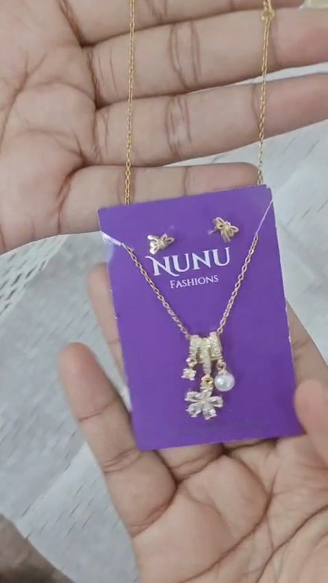 Indhu · Thiruvananthapuram · flower-pearl-charm-necklace